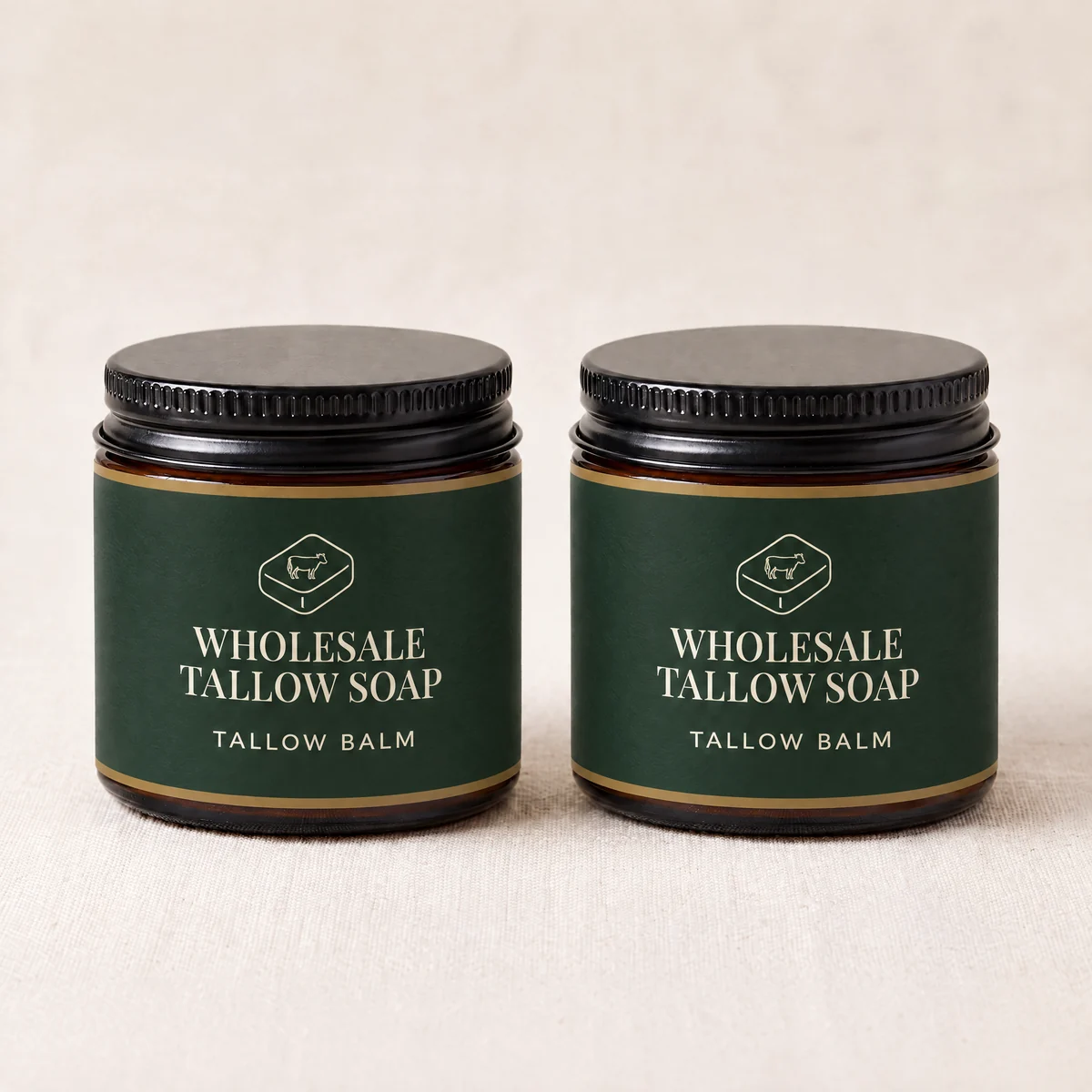 Two amber balm jars with custom printed green band labels