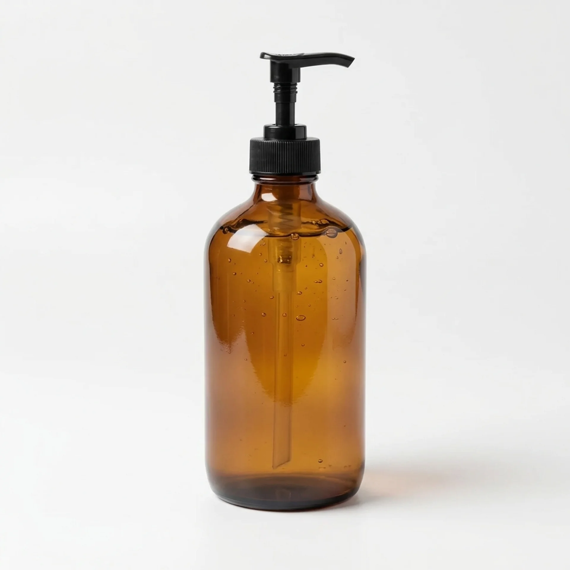Tallow liquid soap in a 16 oz amber glass bottle with a black pump